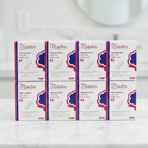 Multiple Maxim Natural Cotton Ultra Thin Panty Liners boxes displayed in a grid, showcasing individually boxed cotton liners for everyday freshness and comfort.