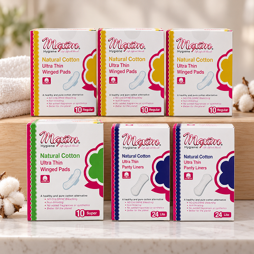 Maxim pure cotton ultra thin feminine care assortment featuring winged pads (10 regular, 8 super) and ultra thin panty liners (20 lite) with organic top sheet, shown as multiple boxes on white background.