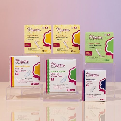 Maxim organic cotton period care collection featuring plastic applicator tampons (16 regular, 14 super), pure cotton ultra thin winged pads (10 regular, 8 super), and ultra thin panty liners (20 lite) on white background.