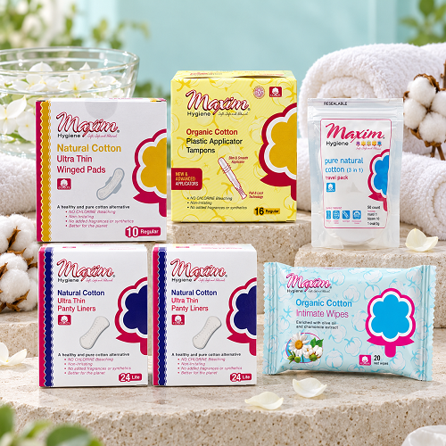 Maxim natural cotton hygiene assortment with ultra thin winged pads, panty liners (24 lite), organic cotton plastic applicator tampons (16 regular), 3-in-1 travel cotton pack, and organic cotton intimate wipes (20), displayed together.