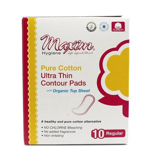 Front packaging of Maxim Hygiene Pure Cotton Ultra Thin Contour Pads with an organic top sheet, featuring a 10-count regular absorbency pack that is chlorine-free and fragrance-free.