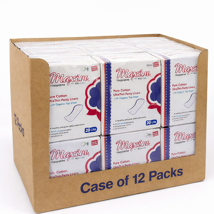 Cardboard display case labeled ‘Case of 12 Packs’ filled with Maxim Pure Cotton Ultra Thin Panty Liners (20 Lite) boxes, stacked inside the open case.