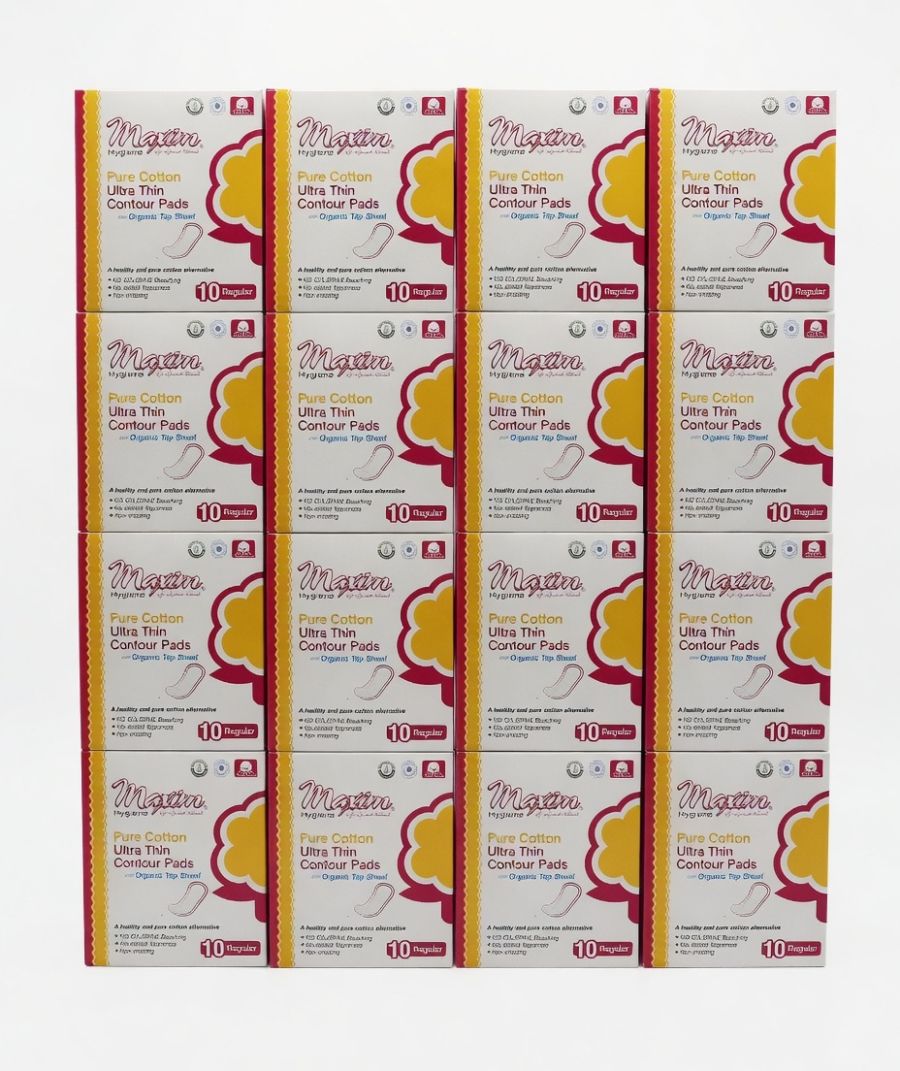 A bulk supply grid of 12 boxes of Maxim Hygiene Pure Cotton Ultra Thin Contour Pads, highlighting the 10-count regular absorbency organic top sheet packs for long-term supply.